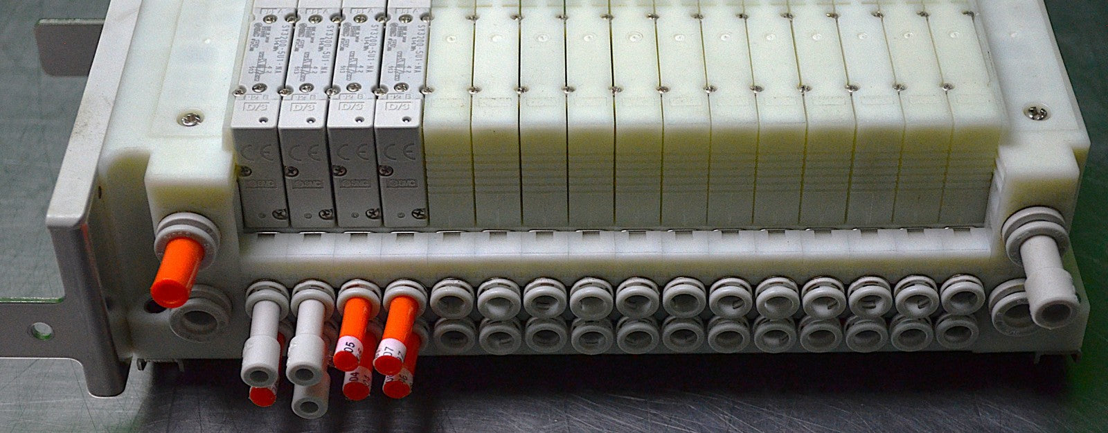 SMC 16-Position Valve Block Assembly with 4 SY3200-5U1-NA Valves